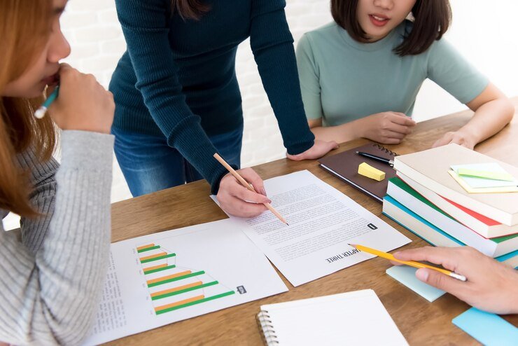 female college students discussing project 8087 312